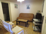cabine avec clic-clac 2 places  et 2 fauteuils