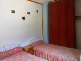 Chambre double avec deux lits simples
