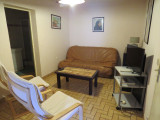 cabine avec clic-clac 2 places et 2 fauteuils