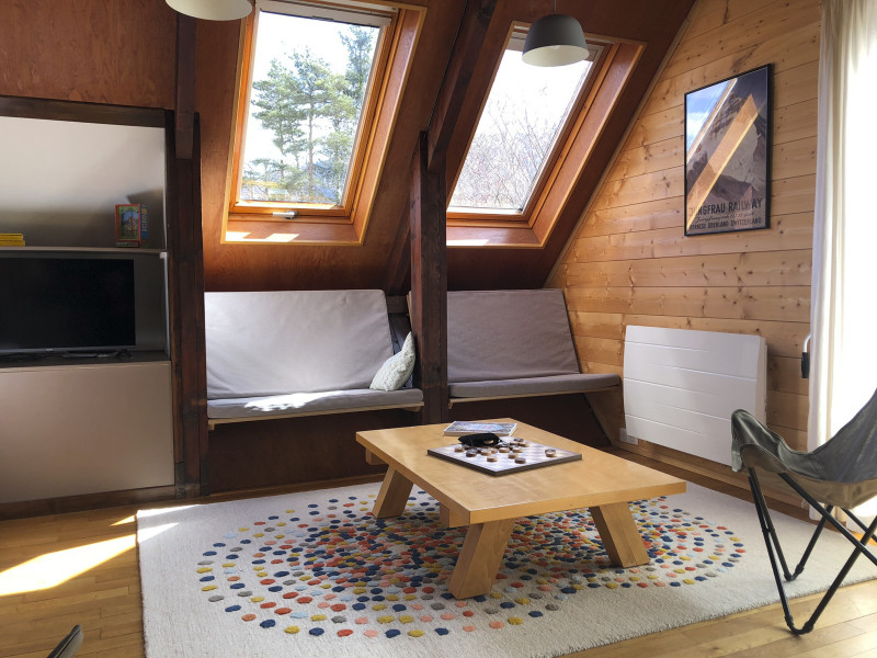 Séjour avec canapé et fauteuils